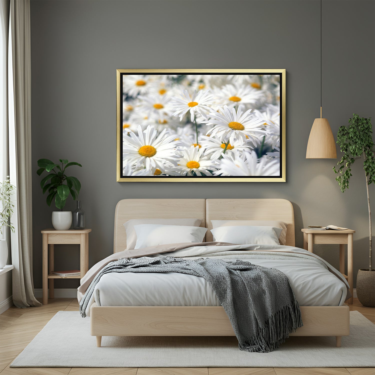 Golden framed wall art of white daisy flowers in a green field, designed for elegant, nature-inspired interior decoration