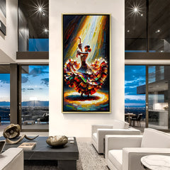 Hand-painted canvas wall art of a woman dancing in a colorful flowing dress in golden floater frame