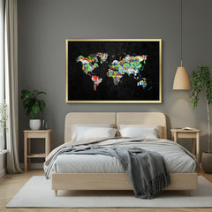 Golden-framed modern canvas of world map in expressive altered painting style—premium wall art for luxury home decor, modern lounges, and statement walls
