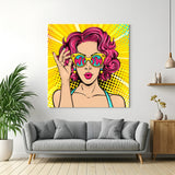 Colorful pop art canvas of a surprised woman with pink curly hair and open mouth, holding sunglasses with WOW text—ideal for bold retro comic wall decor